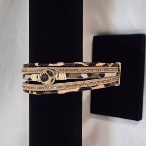 Brown and Gold Bracelet with Intricate Design and Textured Finish